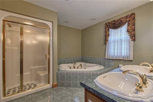 bathroom with vanity, tile patterned floors, and separate shower and tub