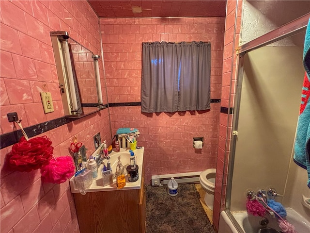 full bathroom with enclosed tub / shower combo, vanity, a baseboard radiator, toilet, and tile walls