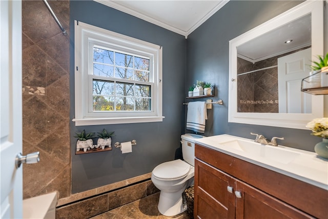 bathroom featuring ornamental molding, a tile shower, vanity, and toilet