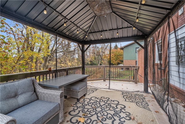 wooden deck with a gazebo