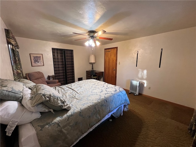 bedroom featuring radiator heating unit, ceiling fan, and carpet floors