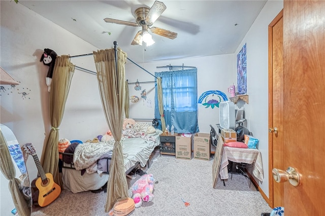 bedroom with ceiling fan and carpet