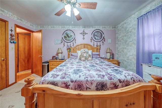 bedroom featuring ceiling fan and carpet flooring