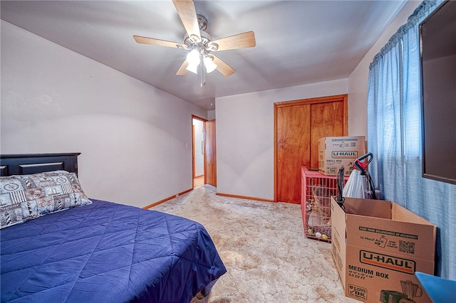 bedroom with ceiling fan and light colored carpet