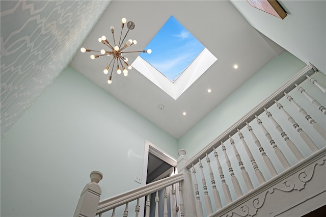 room details with a skylight and a notable chandelier