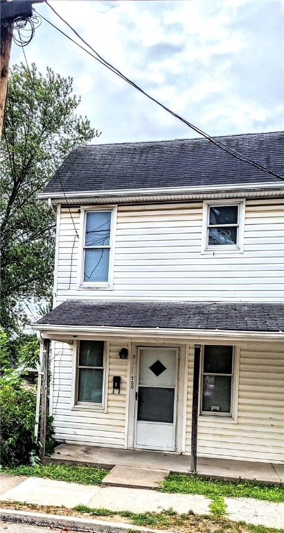 view of front of property featuring covered porch