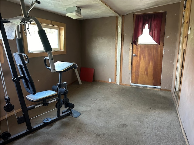 workout room featuring vaulted ceiling