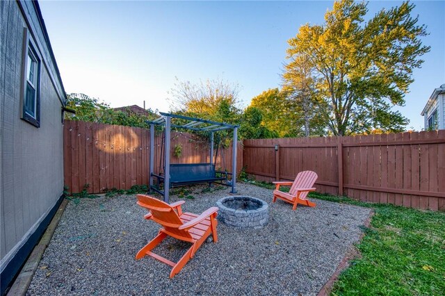 2759 Brodhead Rd, Aliquippa, PA 15001 - fenced backyard with an outdoor fire pit