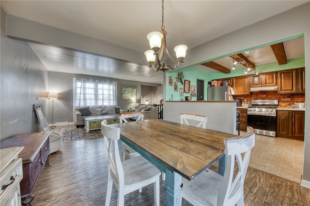 dining room featuring beamed ceiling, hardwood / wood-style floors, and a notable chandelier