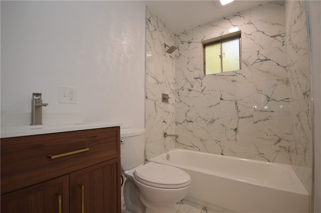 full bathroom featuring vanity, toilet, and tiled shower / bath