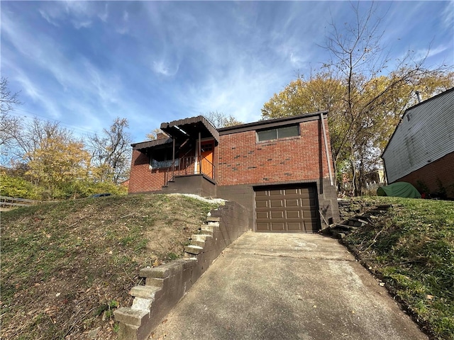 view of front of home featuring a garage