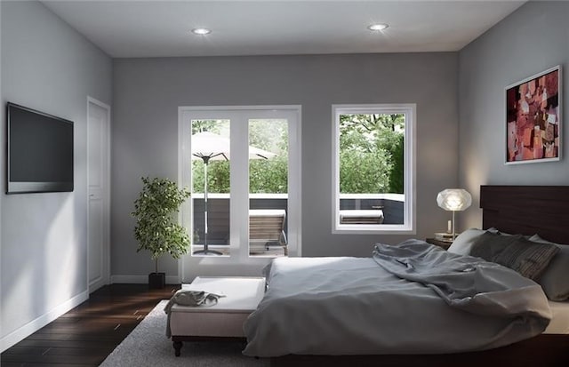 bedroom featuring dark hardwood / wood-style flooring