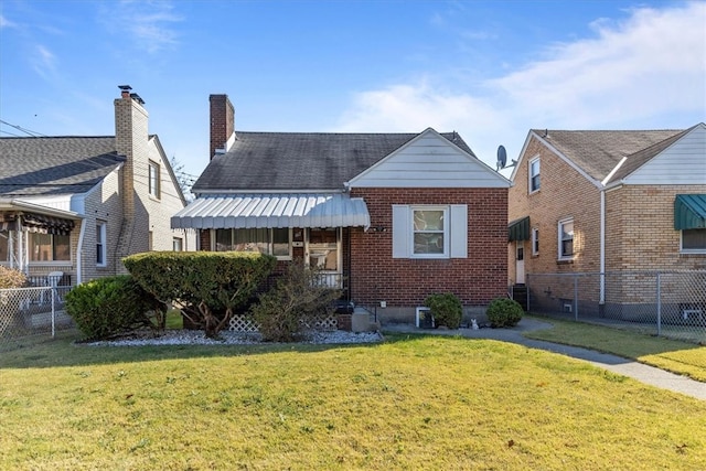 view of front of home with a front yard