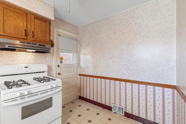 kitchen featuring white gas stove