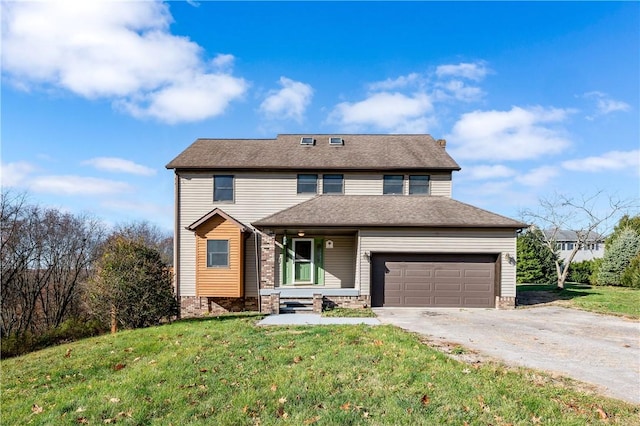 front of property featuring a front lawn and a garage