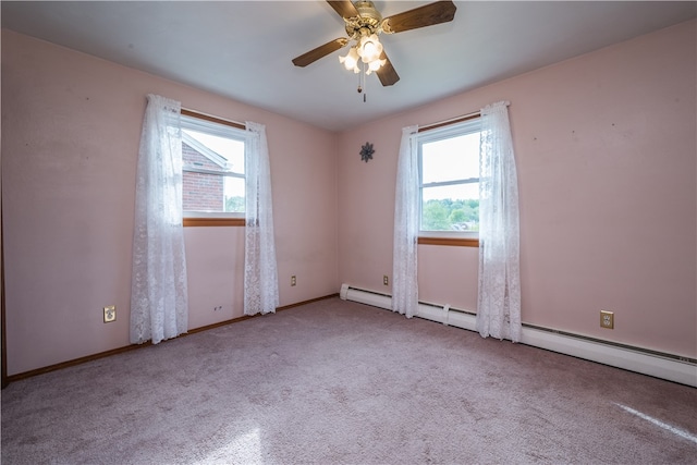 unfurnished room featuring ceiling fan and plenty of natural light