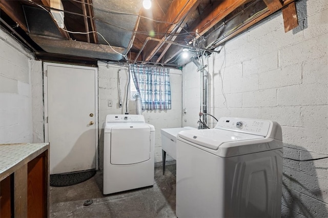 laundry room with independent washer and dryer