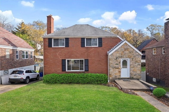 view of property featuring a front yard