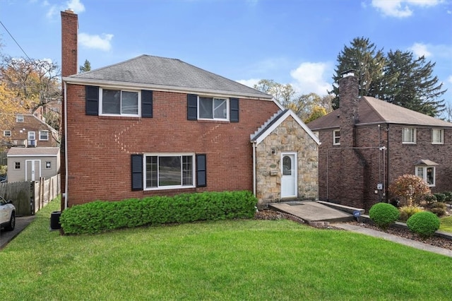 front of property featuring a front lawn