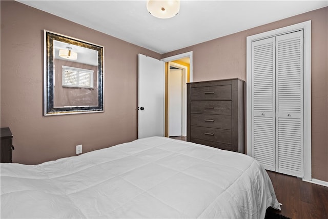 bedroom featuring a closet and hardwood / wood-style floors