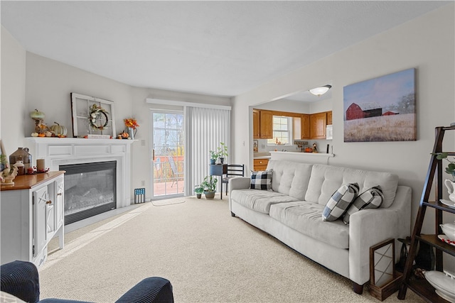 living room featuring light carpet