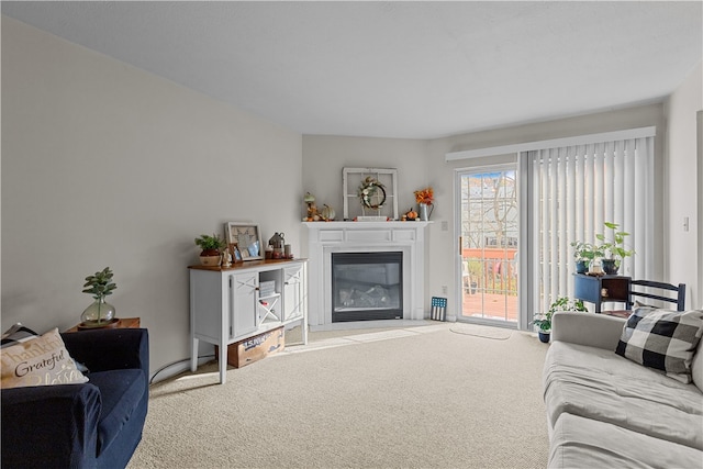 living room with carpet and a healthy amount of sunlight