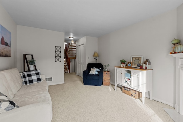 living room featuring light carpet