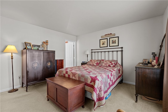 bedroom with light carpet