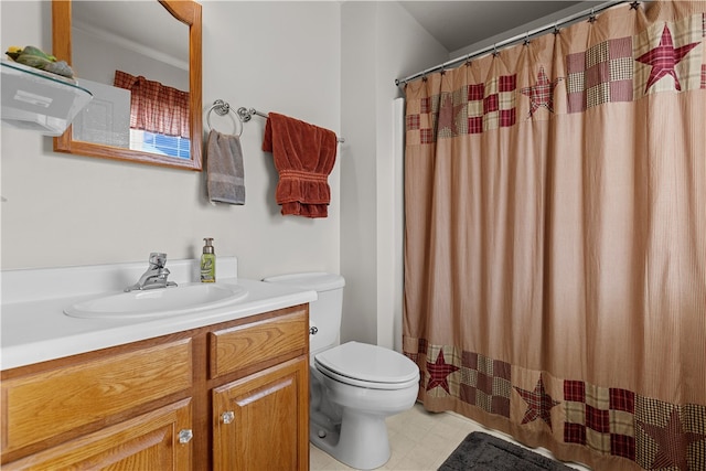 bathroom featuring toilet and vanity