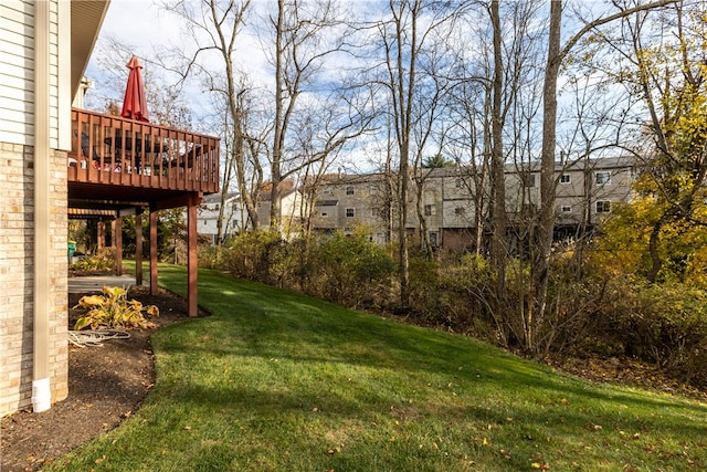 view of yard featuring a wooden deck