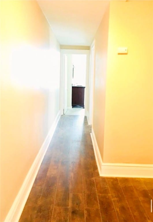 hall featuring dark hardwood / wood-style floors