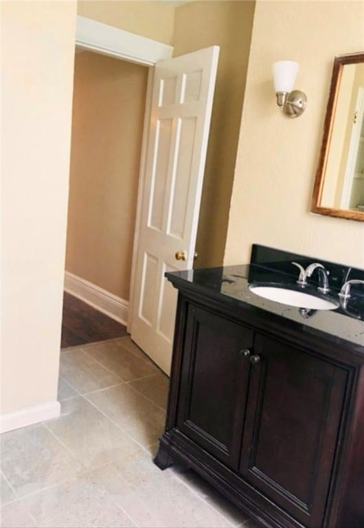 bathroom featuring vanity and tile patterned floors