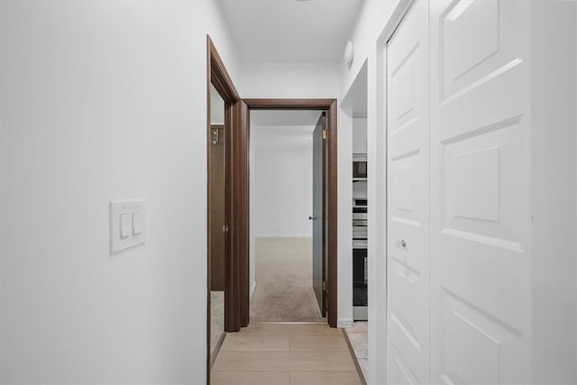 hall featuring light hardwood / wood-style floors