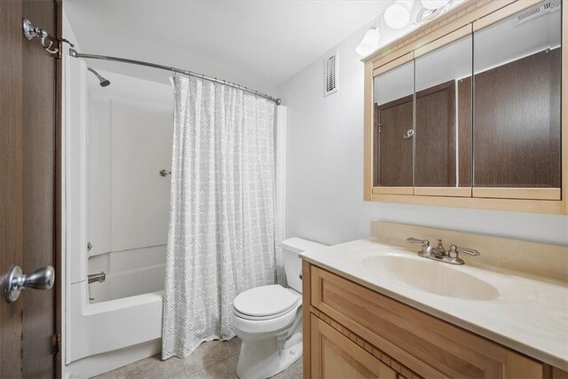 full bathroom with toilet, vanity, tile patterned floors, and shower / tub combo with curtain