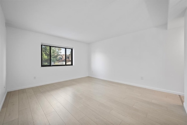 empty room featuring light hardwood / wood-style floors