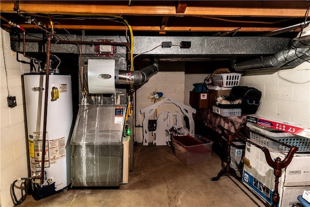 utility room featuring water heater