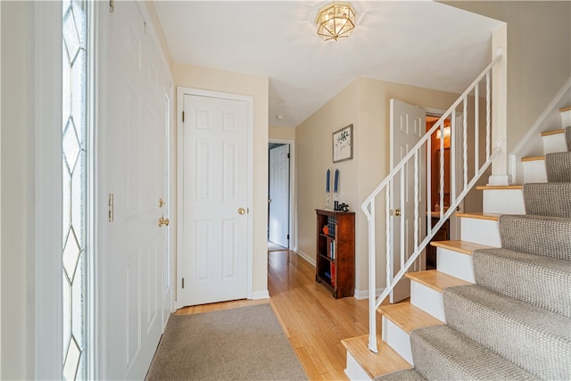 entrance foyer with light hardwood / wood-style floors