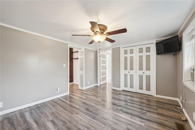 356 Stewarton Rd, Springfield Twp Fay, PA 15465 - unfurnished bedroom featuring wood finished floors, ceiling fan, and ensuite bathroom