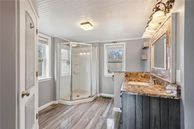 356 Stewarton Rd, Springfield Twp Fay, PA 15465 - full bathroom featuring plenty of natural light, wood finished floors, a shower stall, vanity, and ornamental molding