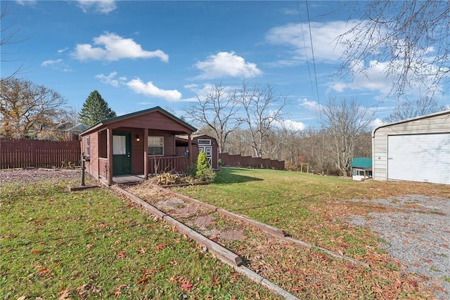 356 Stewarton Rd, Springfield Twp Fay, PA 15465 - view of yard with an outbuilding and a porch