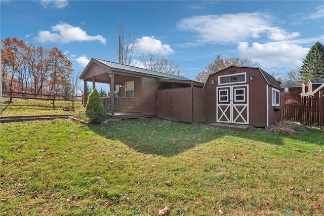 356 Stewarton Rd, Springfield Twp Fay, PA 15465 - rear view of house with a storage unit, covered porch, and a metal roof