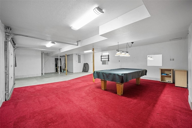 playroom with pool table, electric panel, and a textured ceiling