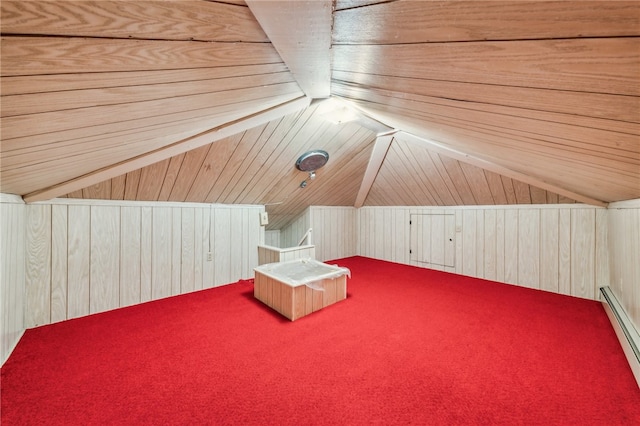 additional living space with carpet floors, wooden walls, vaulted ceiling, wood ceiling, and baseboard heating