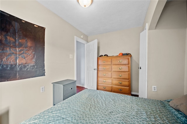 bedroom featuring a textured ceiling