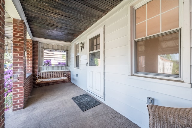 property entrance with a porch