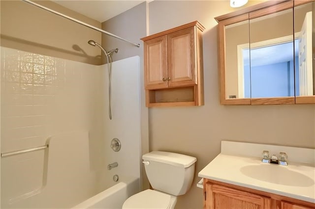 full bathroom with washtub / shower combination, vanity, and toilet