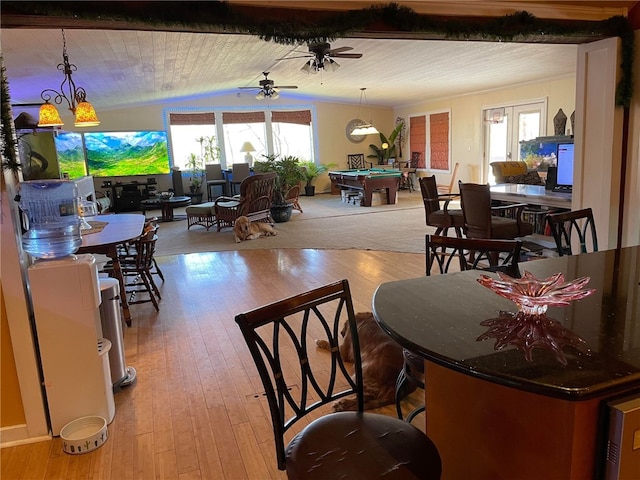 dining room featuring billiards, light hardwood / wood-style flooring, lofted ceiling, and ceiling fan