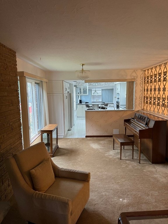 interior space with a chandelier and light carpet