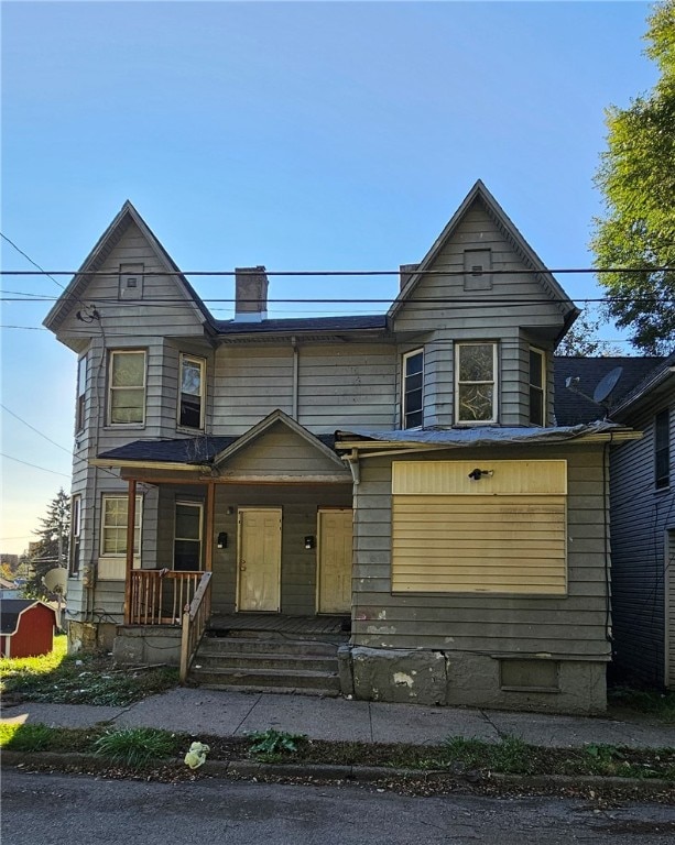 front facade with a porch