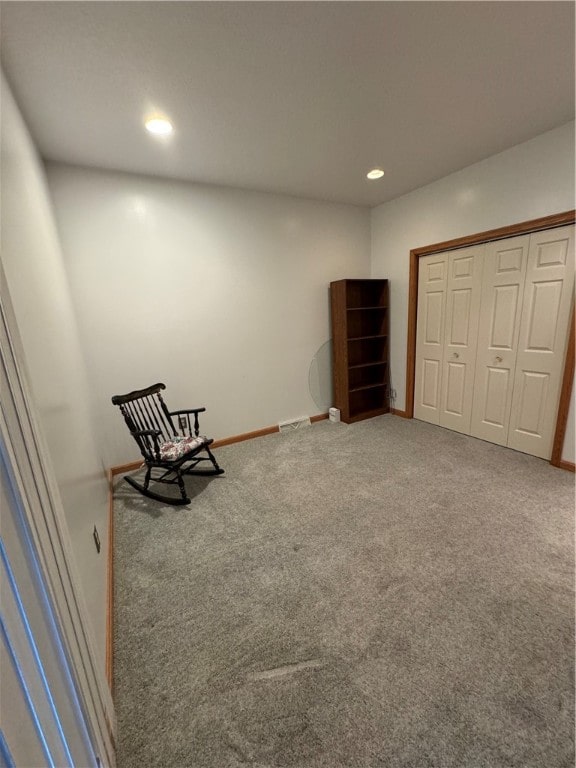 unfurnished room with carpet flooring